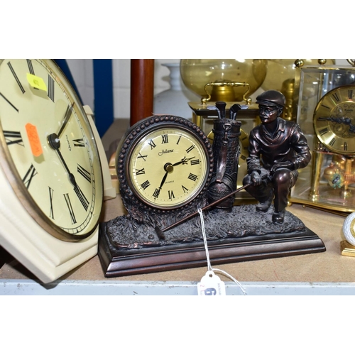 612 - A GROUP OF FIVE QUARTZ CLOCKS WITH ONE OIL LAMP, including two novelty golfing interest clocks, (Jul... 