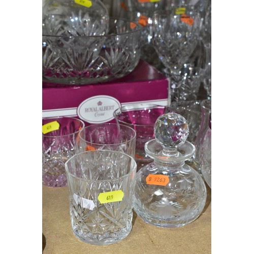 619 - A GROUP OF GLASSWARE AND CUT GLASS, including  four Stuart crystal champagne flutes, three matching ... 