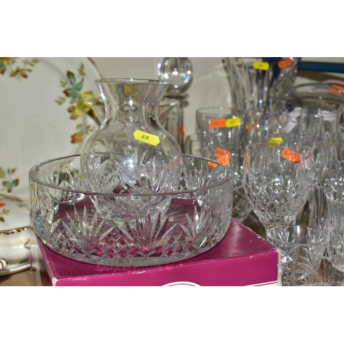 619 - A GROUP OF GLASSWARE AND CUT GLASS, including  four Stuart crystal champagne flutes, three matching ... 