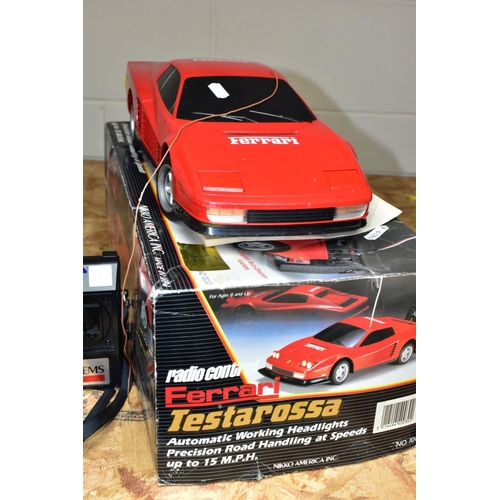 626 - A BOXED NIKKO RADIO CONTROL FERRARI TESTAROSSA, model No 10030, 1/10th scale, pop up headlights, wit... 