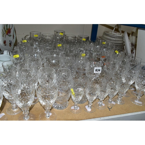 634 - A GROUP OF CUT GLASS, including liquer glasses, sherry glasses, wine glasses, Commemorative tankards... 