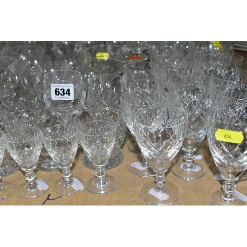 634 - A GROUP OF CUT GLASS, including liquer glasses, sherry glasses, wine glasses, Commemorative tankards... 