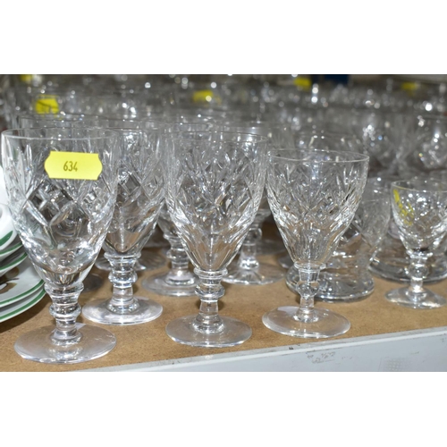 634 - A GROUP OF CUT GLASS, including liquer glasses, sherry glasses, wine glasses, Commemorative tankards... 