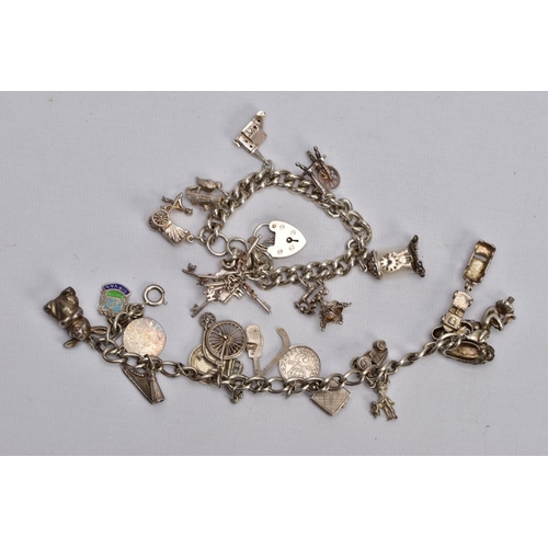 64 - TWO CHARM BRACELETS, the first suspending eight white metal charms in forms such as a bible, church,... 