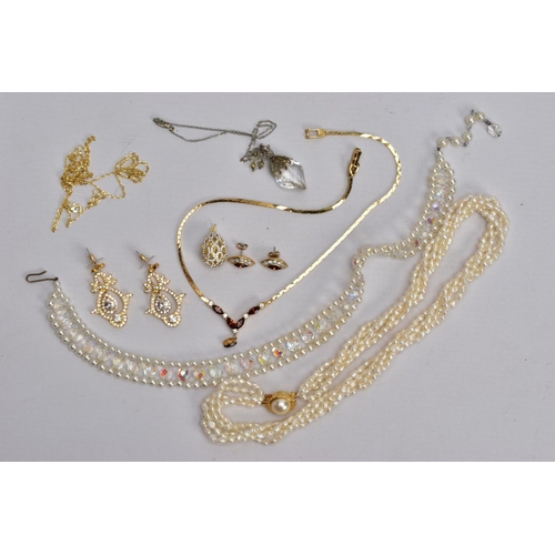 67 - A BAG OF ASSORTED COSTUME JEWELLERY, to include a multi strand cultured pearl necklace fitted with a... 