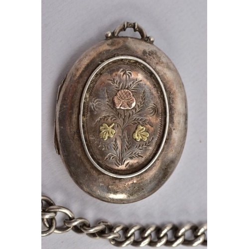 69 - A VICTORIAN SILVER LOCKET, A SILVER ALBERT CHAIN AND AN A.R.P. BADGE, the a.f. Locket of an oval for... 