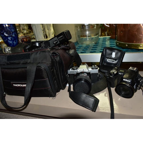 702 - PHOTOGRAPHIC EQUIPMENT, comprising Minolta XG-1 35mm film SLR Camera body fitted with a Sirius 28-70... 