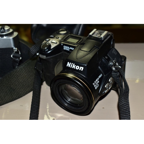 702 - PHOTOGRAPHIC EQUIPMENT, comprising Minolta XG-1 35mm film SLR Camera body fitted with a Sirius 28-70... 