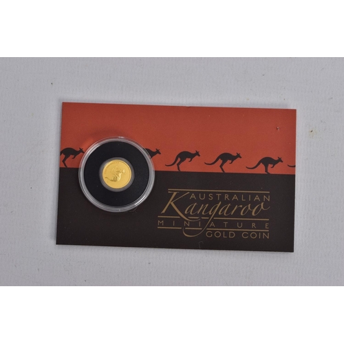 73 - AN AUSTRALIAN KANGAROO MINIATURE GOLD COIN, unopened in original packaging, 0.5 gram 9999 gold, reve... 