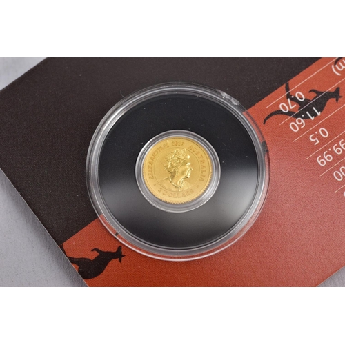 73 - AN AUSTRALIAN KANGAROO MINIATURE GOLD COIN, unopened in original packaging, 0.5 gram 9999 gold, reve... 