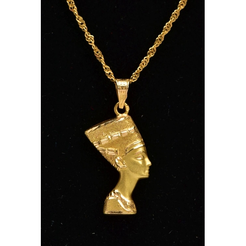 11 - A YELLOW METAL PENDANT NECKLACE, the pendant in the form of the Egyptian Queen Nefertiti fitted with... 