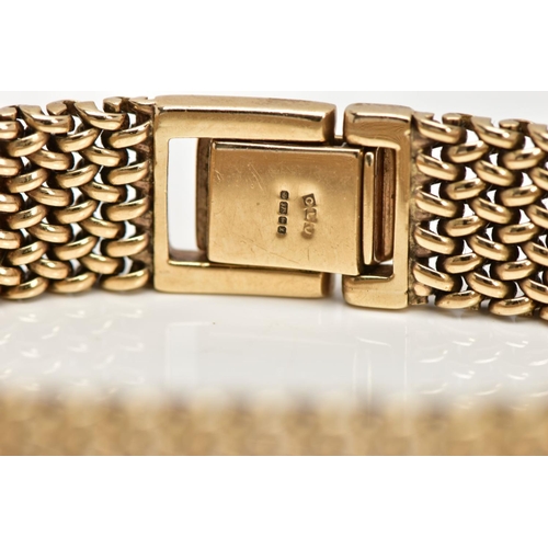 15 - A 9CT GOLD HEAVY MESH BRACELET, approximate width 12.7mm, fitted with a fold over clasp, hallmarked ... 