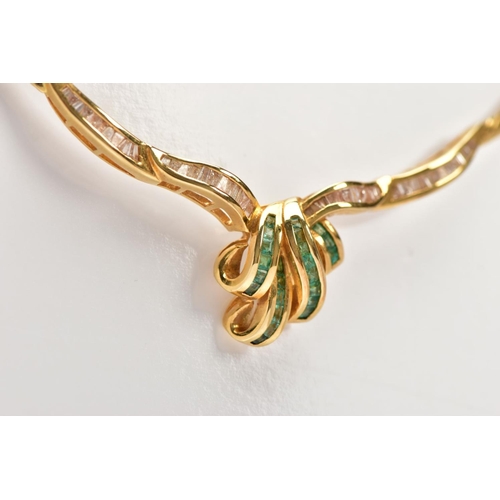 4 - AN 18CT GOLD EMERALD AND DIAMOND NECKLACE AND A PAIR OF 18CT GOLD EMERALD STUD EARRINGS, the central... 