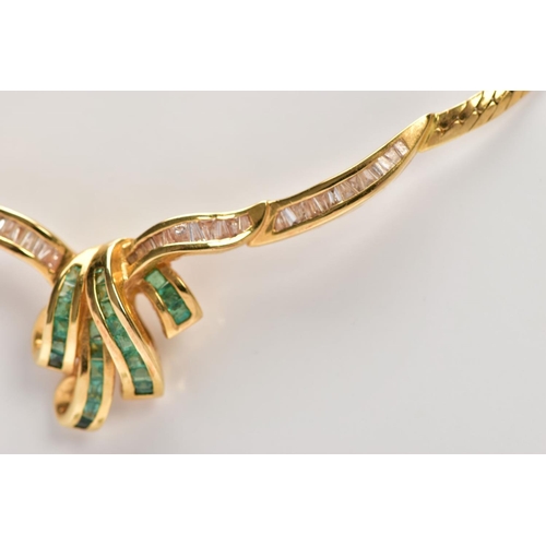 4 - AN 18CT GOLD EMERALD AND DIAMOND NECKLACE AND A PAIR OF 18CT GOLD EMERALD STUD EARRINGS, the central... 