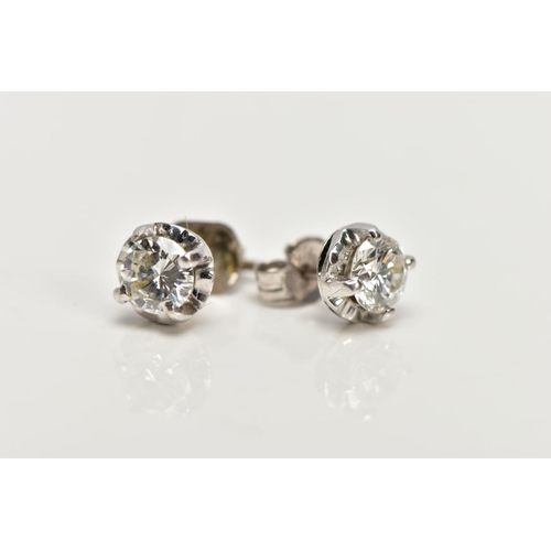 44 - A PAIR OF 14CT WHITE GOLD DIAMOND STUD EARRINGS, each designed with a claw set round brilliant cut d... 