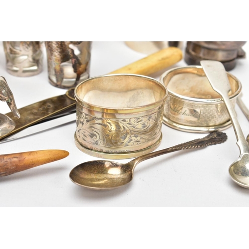 100 - A BOX OF SILVER AND OTHER METALWARE, to include three hallmarked napkin rings, a silver cap for a mi... 