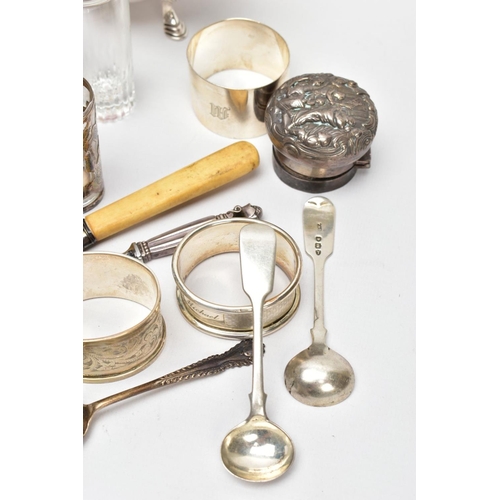 100 - A BOX OF SILVER AND OTHER METALWARE, to include three hallmarked napkin rings, a silver cap for a mi... 
