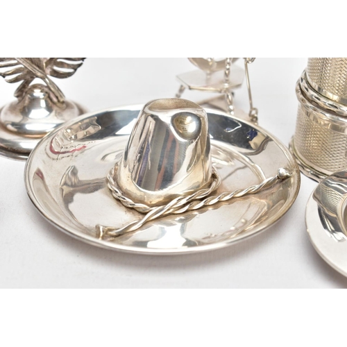 106 - A COLLECTION OF SILVER AND WHITE METAL ITEMS, to include four hallmarked silver napkin rings, two of... 