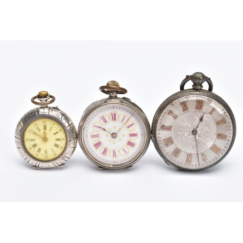 114 - THREE EARLY 20TH CENTURY SILVER OPEN FACE POCKET WATCHES, all with Roman numerals and engraved decor... 