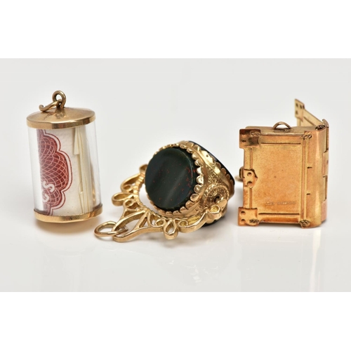 117 - THREE 9CT GOLD CHARMS, to include a 9ct gold swivel charm set with onyx and bloodstone panels, a 9ct... 