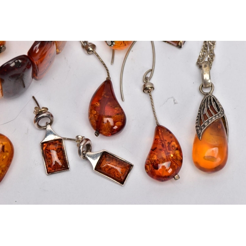 120 - A SELECTION OF MAINLY CLARIFIED AMBER JEWELLERY, including an elasticated panel bracelet, a pair of ... 