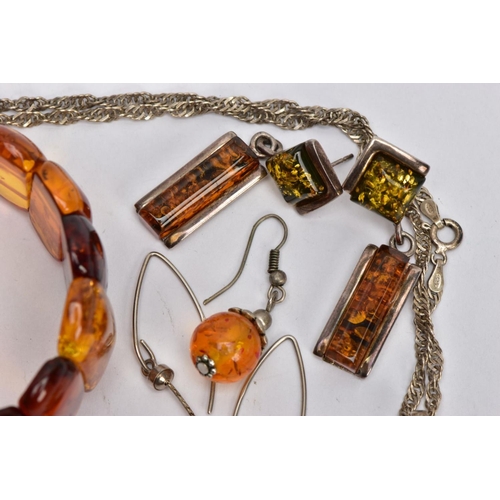 120 - A SELECTION OF MAINLY CLARIFIED AMBER JEWELLERY, including an elasticated panel bracelet, a pair of ... 