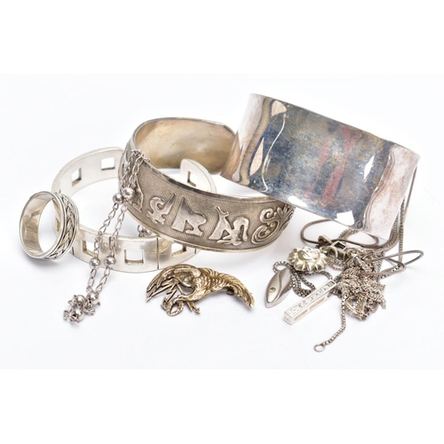 125 - A SELECTION OF SILVER AND WHITE METAL JEWELLERY, to include three torque bangles, a rope twist desig... 