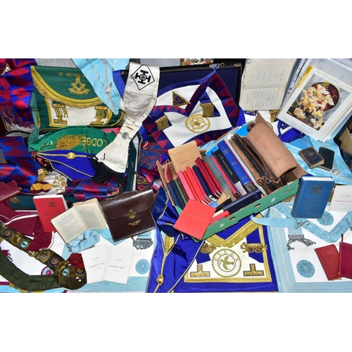 141 - A LARGE QUANTITY OF MASONIC BOOKS AND REGALIA, to include a number of aprons in two suitcases and a ... 
