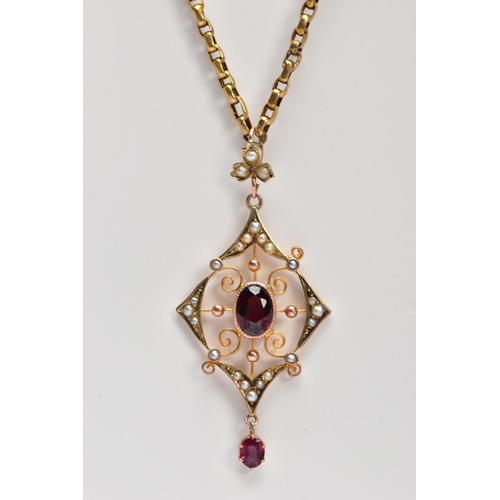 22 - AN EARLY 20TH CENTURY GARNET AND SPLIT PEARL PENDANT NECKLACE, the openwork drop pendant, set with a... 