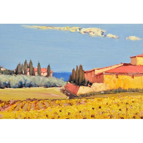 276 - BRUNO TINUCCI (ITALIAN 1947) 'SPLENDORI DELLA TOSCANA II' a landscape of sunflowers before a farmhou... 