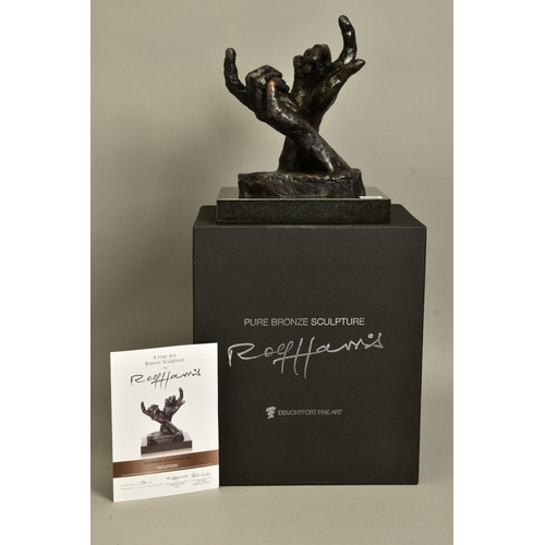 296 - ROLF HARRIS (AUSTRALIAN 1930) 'INTUITUIONS' a limited edition bronze sculpture of two hands 118/595,... 