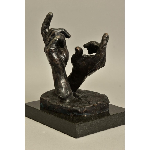 296 - ROLF HARRIS (AUSTRALIAN 1930) 'INTUITUIONS' a limited edition bronze sculpture of two hands 118/595,... 