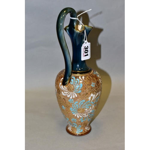 301 - A ROYAL DOULTON SLATERS PATENT STONEWARE EWER, mottled green/blue glazed handle and neck, the balust... 