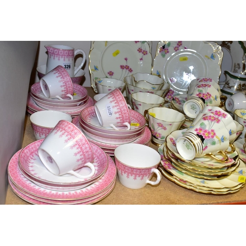 326 - FOUR TEA/DINNER SETS, comprising Royal Worcester pink trim decorated part tea service (milk, jug, su... 