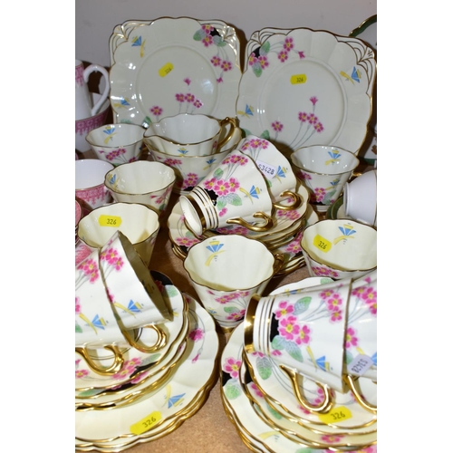 326 - FOUR TEA/DINNER SETS, comprising Royal Worcester pink trim decorated part tea service (milk, jug, su... 