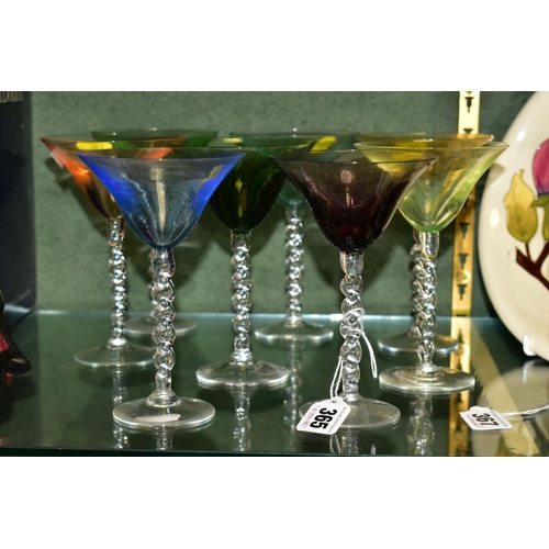 365 - A SET OF EIGHT HARLEQUIN COCKTAIL GLASSES, with clear glass barley twist stems, height 15cm (conditi... 