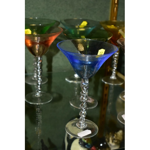 365 - A SET OF EIGHT HARLEQUIN COCKTAIL GLASSES, with clear glass barley twist stems, height 15cm (conditi... 