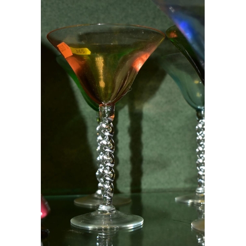 365 - A SET OF EIGHT HARLEQUIN COCKTAIL GLASSES, with clear glass barley twist stems, height 15cm (conditi... 