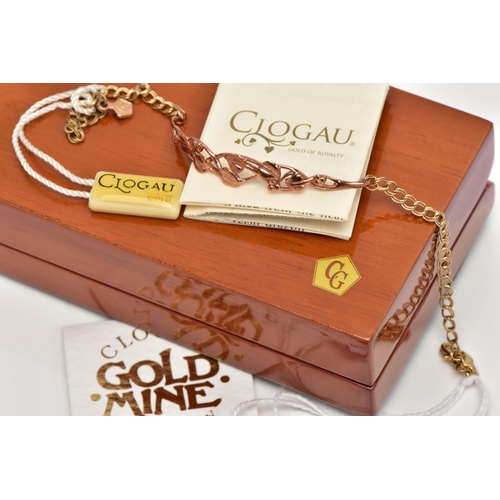 50 - A 9CT GOLD BI-COLOUR CLOGAU BRACELET, the central panel of openwork 'Tree of Life' design in rose go... 