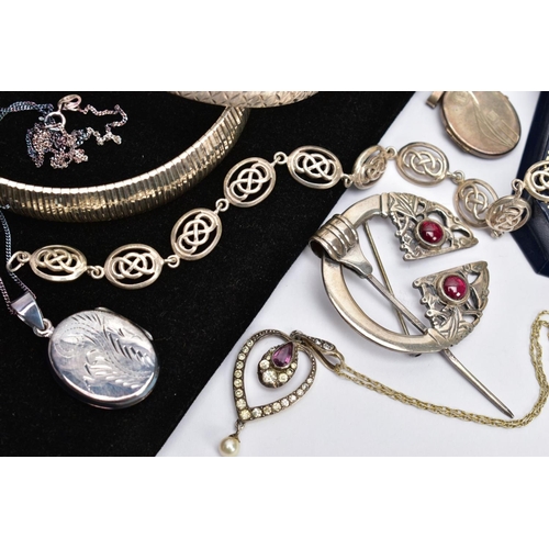 60 - A SELECTION OF SILVER AND WHITE METAL JEWELLERY, to include various charms, two oval lockets, an ear... 