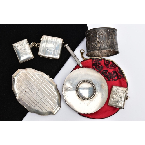 62 - SEVEN SILVER AND WHITE METAL ACCESSORIES, to include three early 20th century silver vesta cases, a ... 