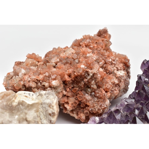 82 - A COLLECTION OF GEM CRYSTALS, to include two quartz geodes, a collection of amethyst crystals and a ... 