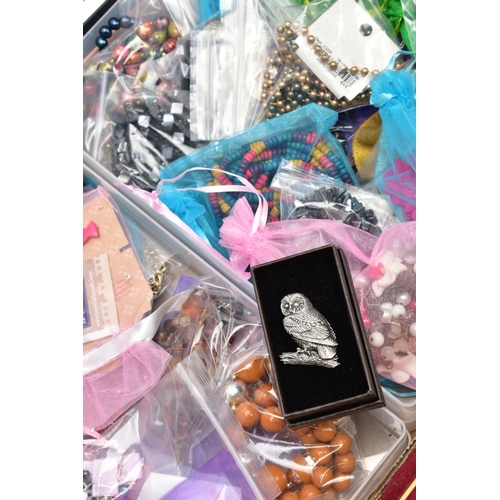 84 - A BOX OF COSTUME JEWELLERY, to include a Trifari stickpin, a Hollywood pendant, a hinged silver plat... 