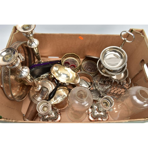 88 - A LARGE BOX OF SILVER PLATED METALWARE, to include a pair of candlesticks, weighted stepped bases, s... 