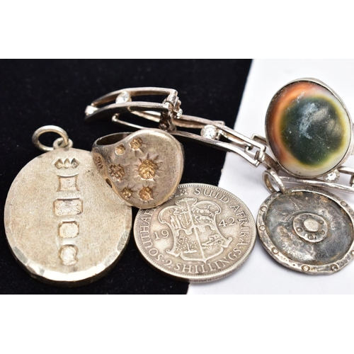 8 - SIX ITEMS, to include a operculum shell ring, an oval silver pendant, a George IV 2 shilling south A... 