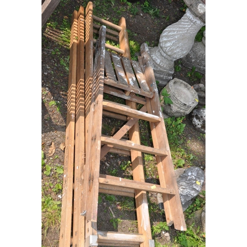 1013 - A SET OF WOODEN TRIPLE EXTENSION LADDERS 183cm long sections, and an earlier wooden step ladder (2)