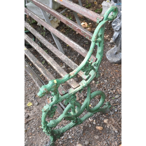 1019 - A VICTORIAN COALBROOKDALE STYLE CAST IRON GARDEN BENCH with foliate detail to arms terminating with ... 