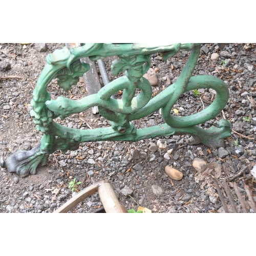 1019 - A VICTORIAN COALBROOKDALE STYLE CAST IRON GARDEN BENCH with foliate detail to arms terminating with ... 