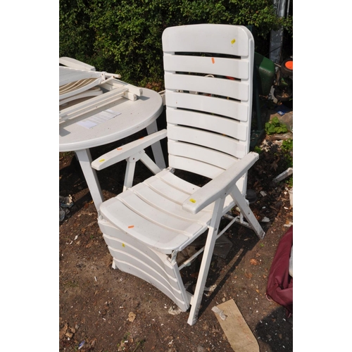 1029 - A WHITE PLASTIC GARDEN TABLE 140cm long , three chairs and a pair of loungers (6)