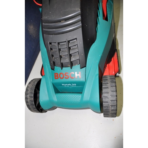 1057 - A BOSCH ROTAK 34 ELECTRIC LAWN MOWER with grass box ( PAT pass and working)